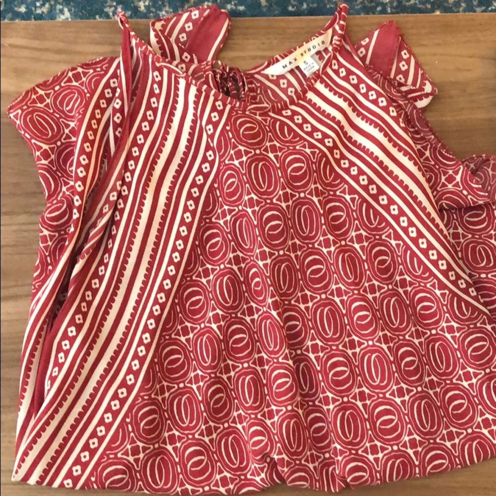 red and white patterned tunic